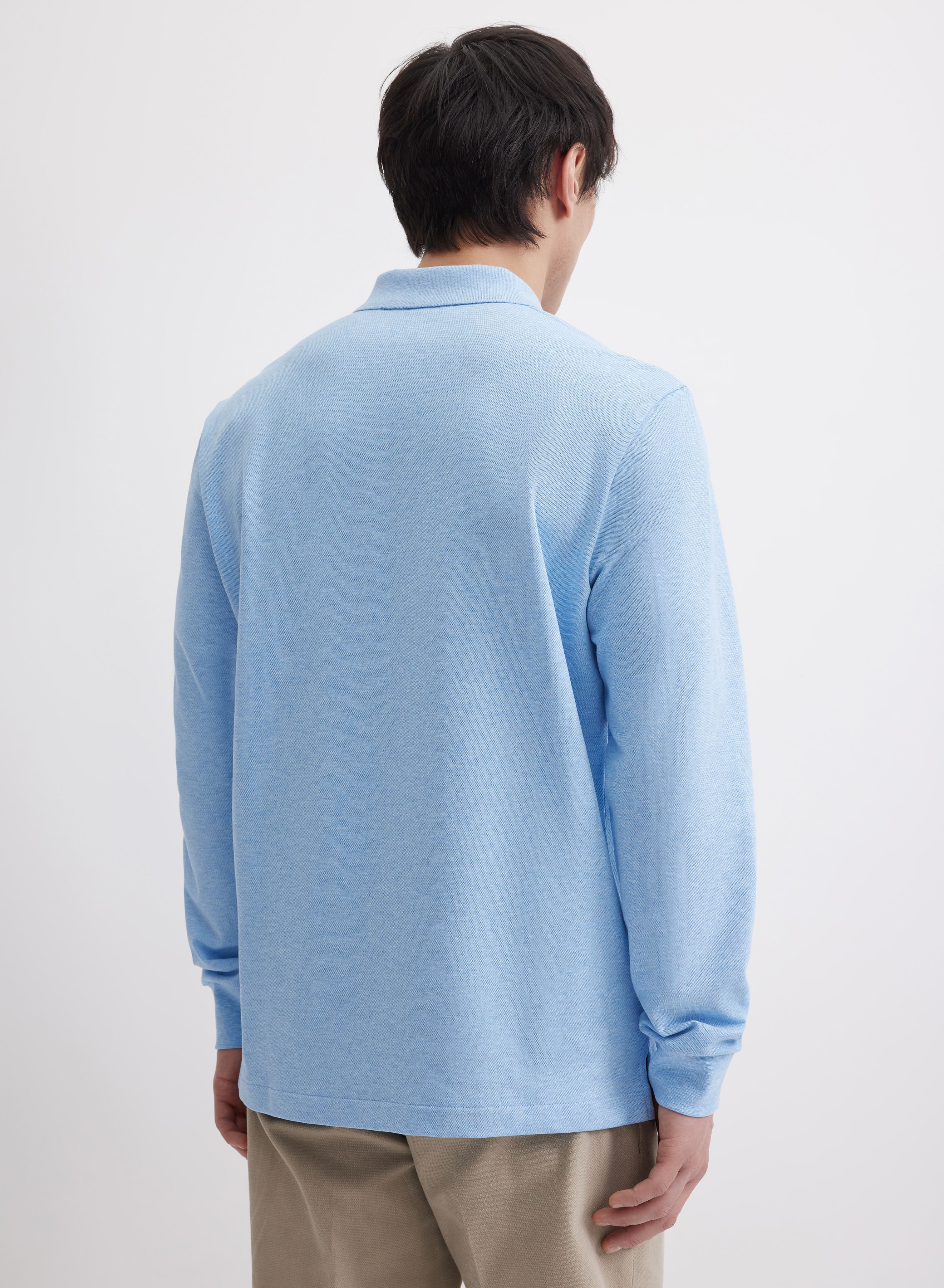 Однотонное голубое поло с длинными рукавами - основное изображение товара