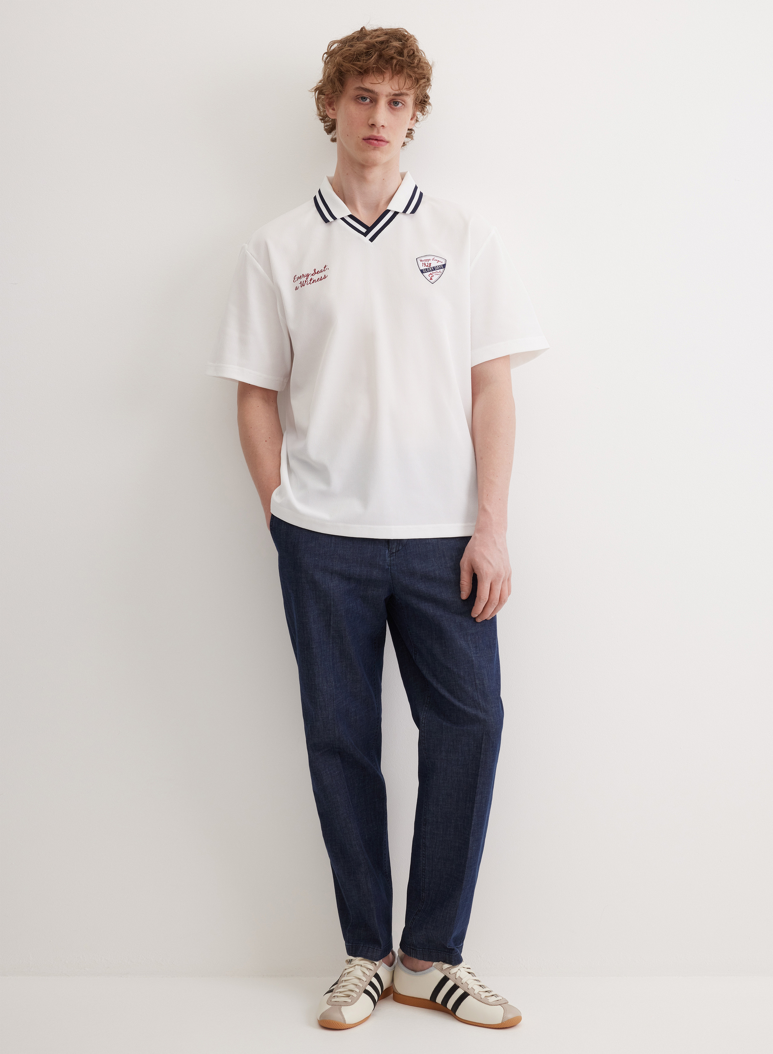 Белое поло с V-образным вырезом  - основное изображение товара